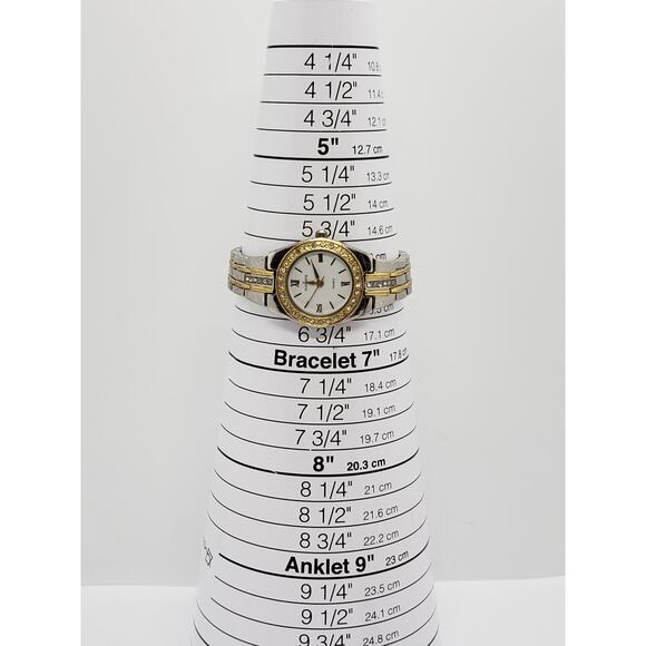 Dufonte 73055WH women\'s dress watch. Jeweled bevel and jewels on band
